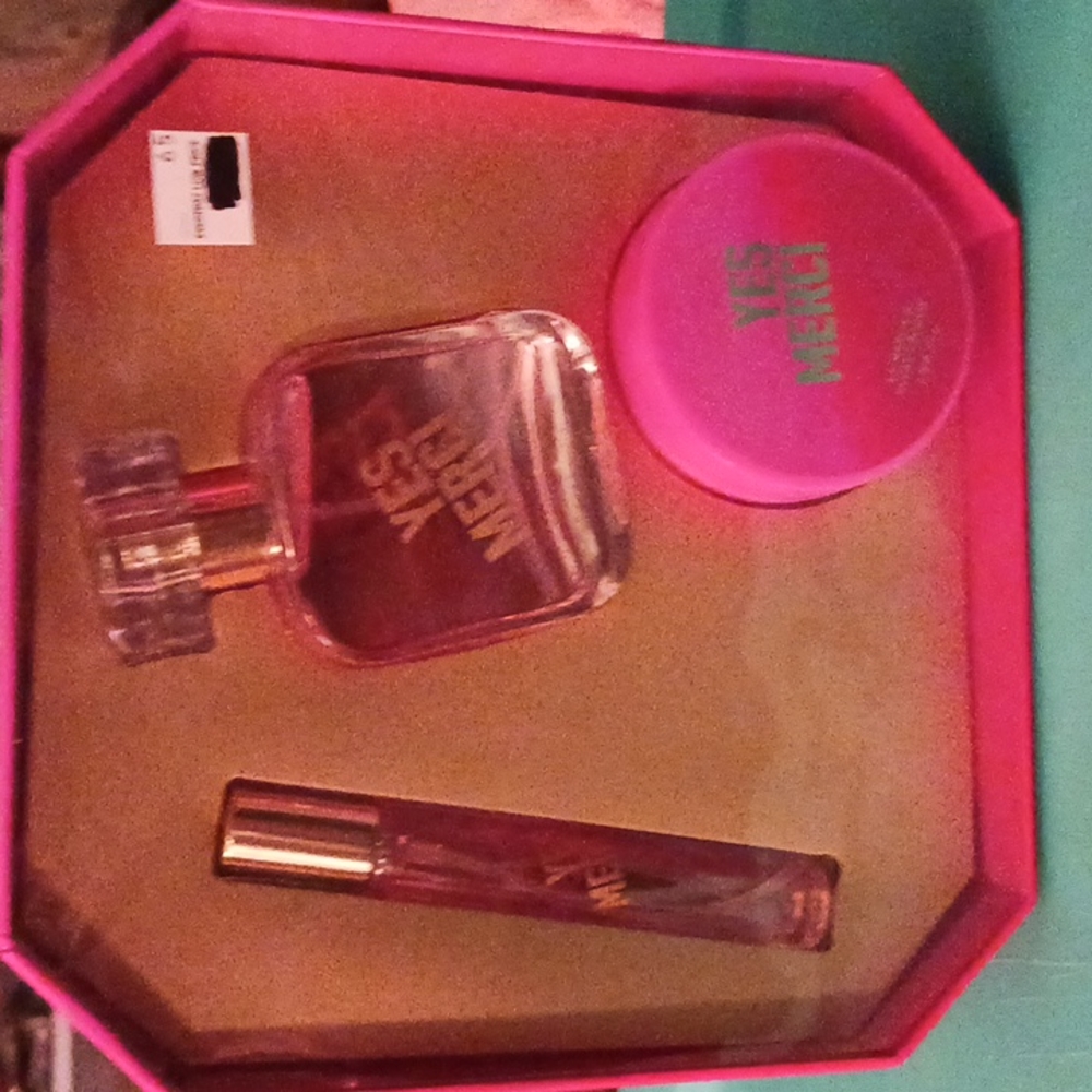 Yes merci body cream,perfume bottle and roll on perfume